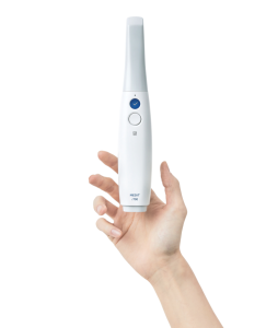 A hand holding a dental imaging device, showcasing its compact design and simplicity, associated with Tooth Suite Maine
